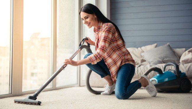 Lady cleaning carpet floor | Carpet Collection